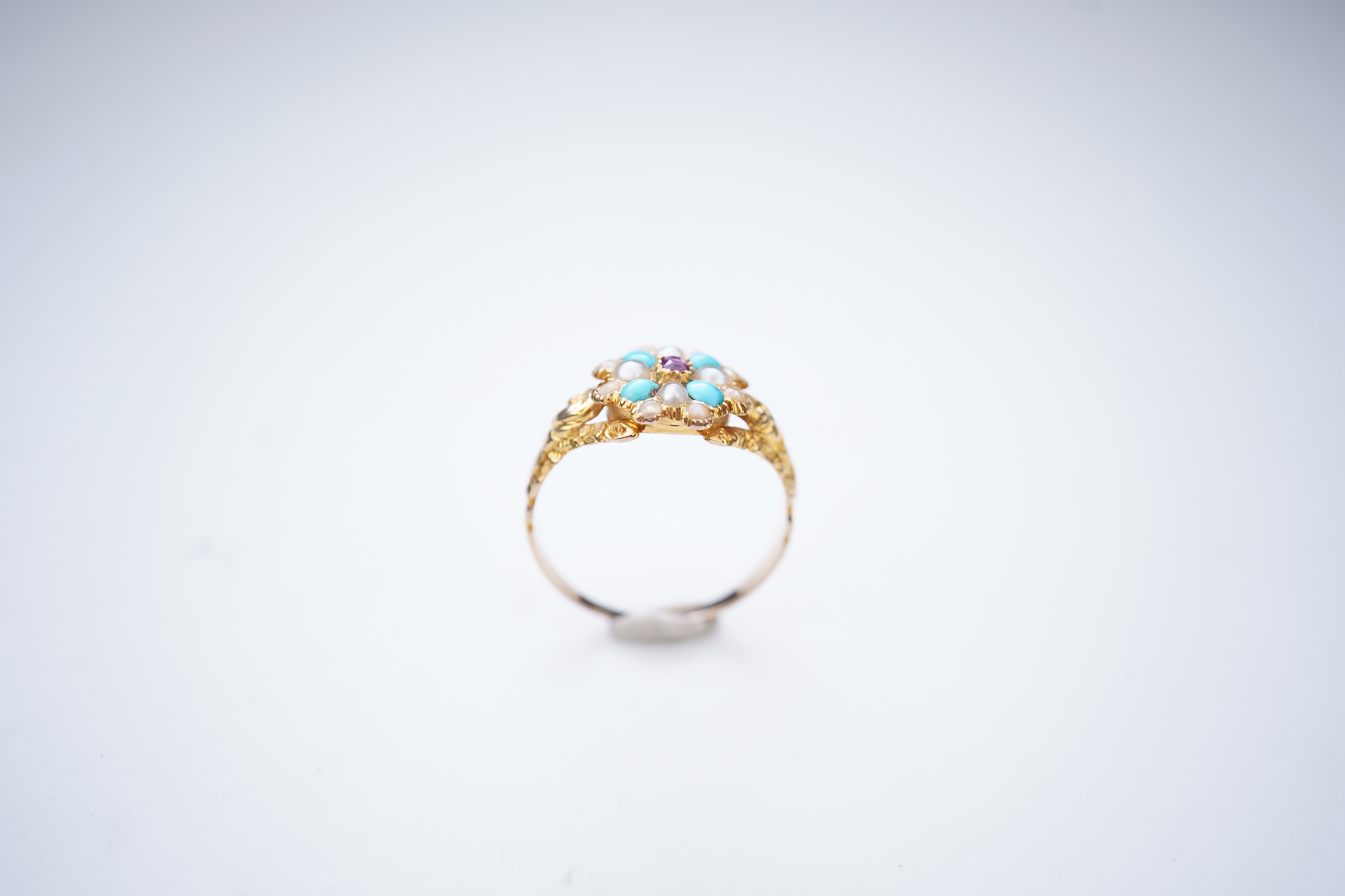A late Georgian garnet, pearl and turquoise ring, circa 1830